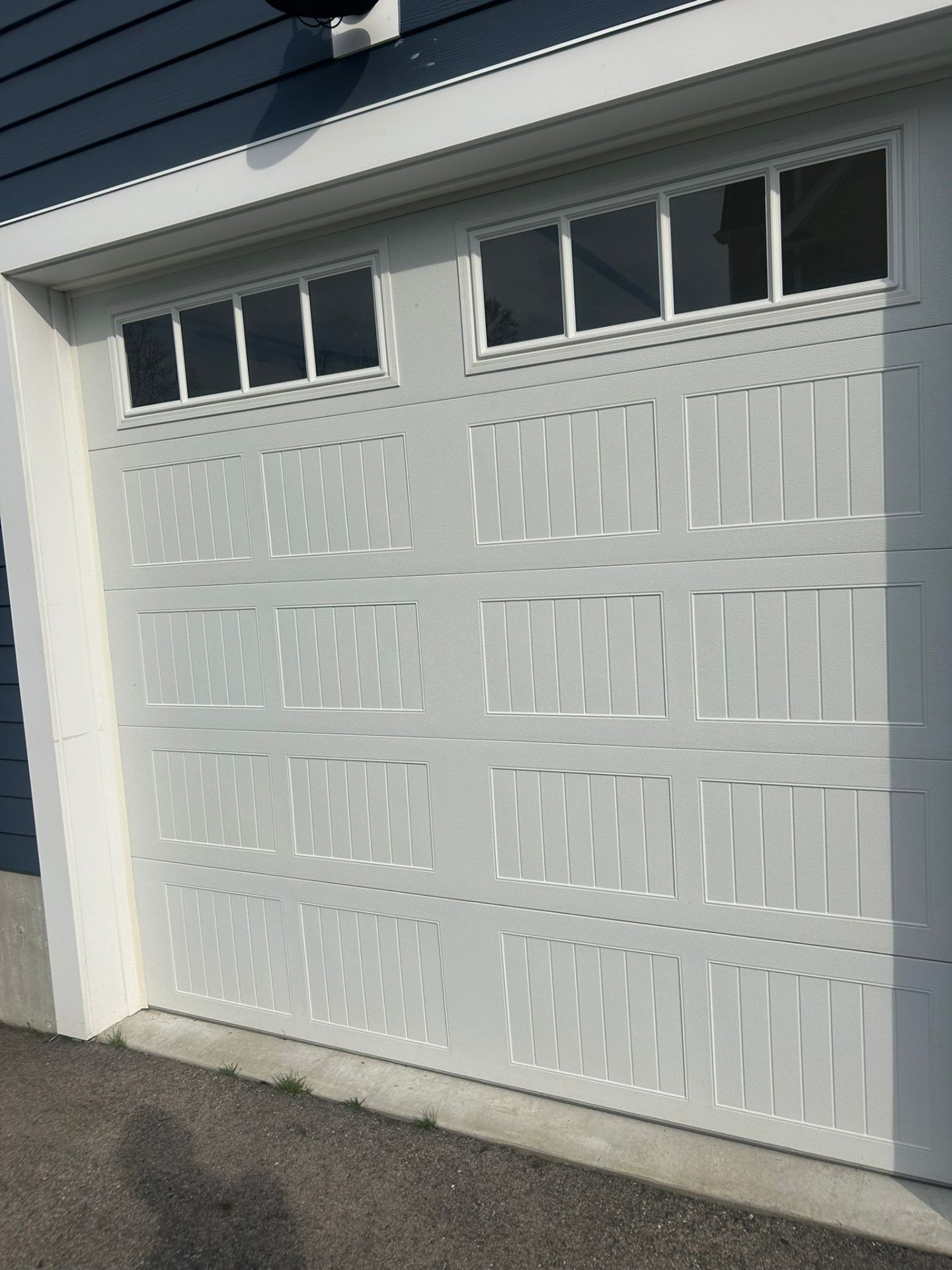 New insulated garage door installed in the North Shore